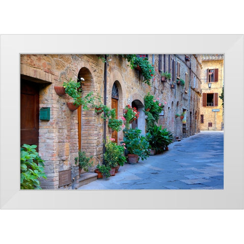 Italy-Tuscany-Pienza Flower pots and potted plants decorate a narrow street in a Tuscany village White Modern Wood Framed Art Print by Eggers, Julie