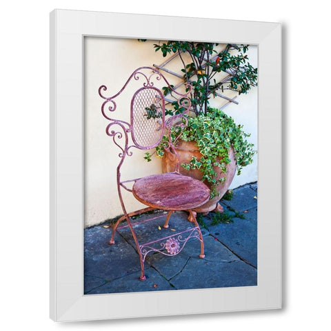 Italy-Tuscany-Lucca Decorative chair and potted plant outside a shop Piazza dellAnfiteatro Romano White Modern Wood Framed Art Print by Eggers, Julie
