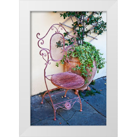 Italy-Tuscany-Lucca Decorative chair and potted plant outside a shop Piazza dellAnfiteatro Romano White Modern Wood Framed Art Print by Eggers, Julie