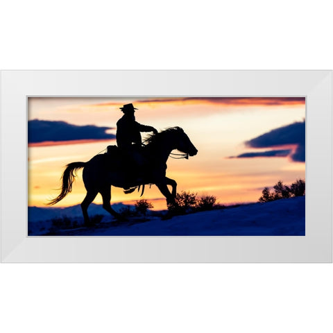 USA- Shell- Wyoming. Hideout Ranch cowgirl silhouetted on horseback at sunset. White Modern Wood Framed Art Print by Gulin, Darrell