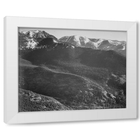 View of wooded hills with mountains in background, in Rocky Mountain National Park, Colorado, ca. 19 White Modern Wood Framed Art Print by Adams, Ansel