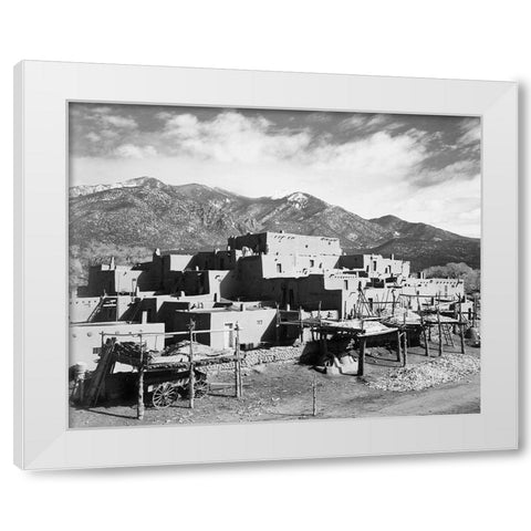 Full view of city, mountains in background, Taos Pueblo National Historic Landmark, New Mexico, 1941 White Modern Wood Framed Art Print by Adams, Ansel