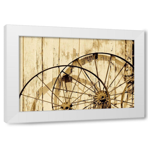 Old wagon wheels against a shed in Buffalo Gap Historic Village, near Abilene, TX - Sepia White Modern Wood Framed Art Print by Highmith, Carol