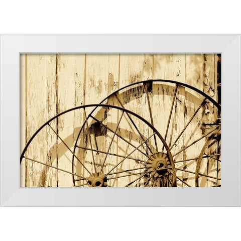 Old wagon wheels against a shed in Buffalo Gap Historic Village, near Abilene, TX - Sepia White Modern Wood Framed Art Print by Highmith, Carol