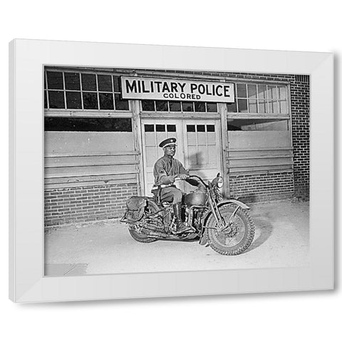 WWII An MP on motorcycle stands ready to answer all calls around his area. Columbus-Georgia White Modern Wood Framed Art Print by U.S. Archives