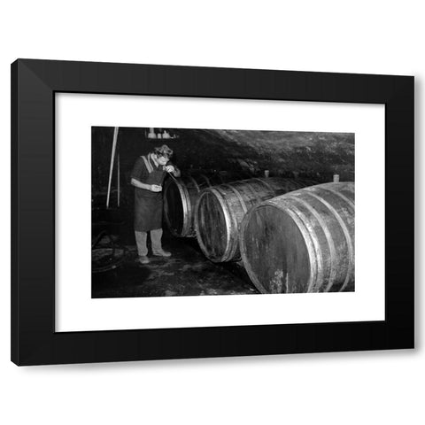 1960's Image Collection by United Archives GmbH - Black Modern Wood Framed Art Print Titled: Winzer bei der Weinprobe in einem Weinkeller in KrÃ¶v, Deutschland 1968. Winegrower checking his product at his wine cellar in Kroev, Germany 1968.