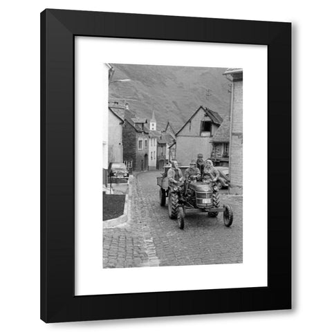 1960's Image Collection by United Archives GmbH - Black Modern Wood Framed Art Print Titled: Traktor in einer Gasse in der Ortschaft Bremm an der Mosel, Deutschland 1968. Tractor in a small lane at the village of Bremm on river Moselle, Ger