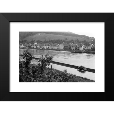 1960's Image Collection by United Archives GmbH - Black Modern Wood Framed Art Print Titled: Blick auf eine malerische Ortschaft an der Mosel, Deutschland 1968. View to a scenic village on river Moselle, Germany 1968.