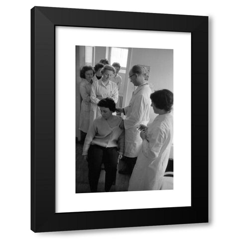 1960's Image Collection by Sueddeutsche Zeitung Photo - Black Modern Wood Framed Art Print Titled: Employees of the Ravensberg Chemische Fabrik, manufacturer of a new vaccine against influenza, are vaccinated with the compound.