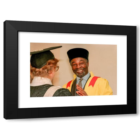 1960's Image Collection by Andrew Hasson - Black Modern Wood Framed Art Print Titled: Thabo Mbeki, Vice-President of the Republic of South Africa, visiting the University of Sussex, in Brighton, where he studied in the early 1960's while ex