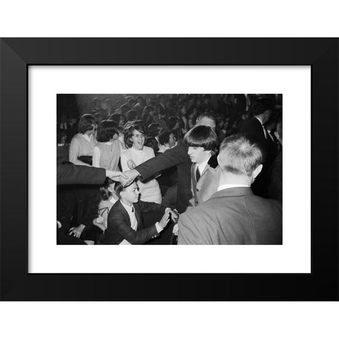 1960's Image Collection by Alpha Historica - Black Modern Wood Framed Art Print Titled: Police join hands to hold back adoring fans as Ringo Starr walks by at the Washington Coliseum in Washington, D.C., where The Beatles were performing in