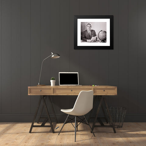 1960's Image Collection by ClassicStock - Black Modern Wood Framed Art Print Titled: 1960s MAN READING FROM DOCUMENT SEATED AT DESK WITH WORLD GLOBE LOOKING AT CAMERA TEACHER NEWSMAN ANNOUNCER BROADCASTER SPEAKER - s11506 HAR001 HARS JOURNA