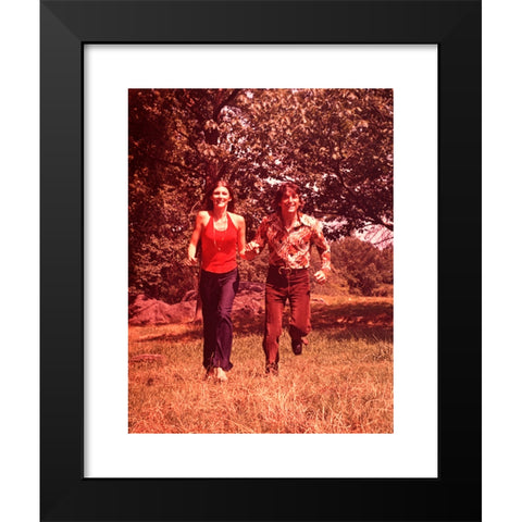 1960's Image Collection by ClassicStock - Black Modern Wood Framed Art Print Titled: 1960s YOUNG COUPLE RUNNING IN FIELD