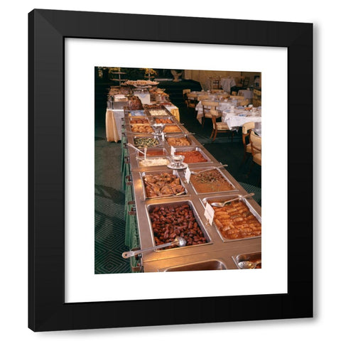 1960's Image Collection by ClassicStock - Black Modern Wood Framed Art Print Titled: 1950s 1960s BUFFET OF HOT DINNER FOODS IN BANQUET ROOM DESSERT TABLE IN BACKGROUND