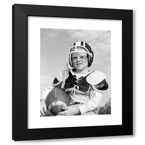 1960's Image Collection by ClassicStock - Black Modern Wood Framed Art Print Titled: 1960s BOY IN FOOTBALL HELMET AND PADS HOLDING BALL SMILING OUTDOOR