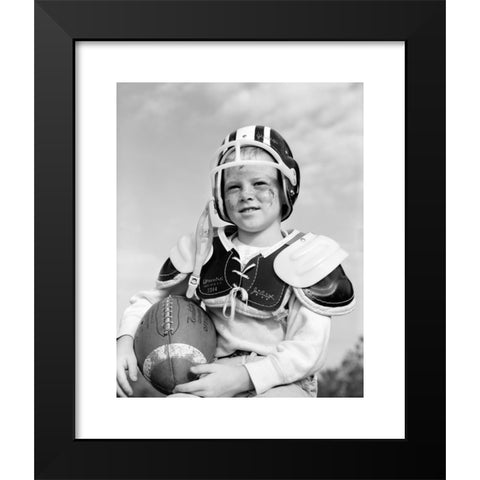 1960's Image Collection by ClassicStock - Black Modern Wood Framed Art Print Titled: 1960s BOY IN FOOTBALL HELMET AND PADS HOLDING BALL SMILING OUTDOOR