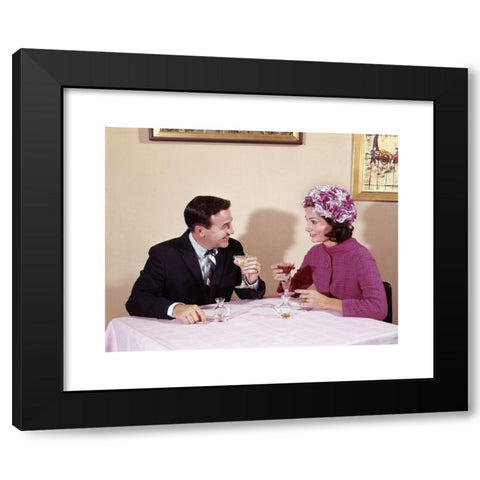 1960's Image Collection by ClassicStock - Black Modern Wood Framed Art Print Titled: 1960s COUPLE DRINKING COCKTAILS AT TABLE HUSBAND WIFE INDOOR