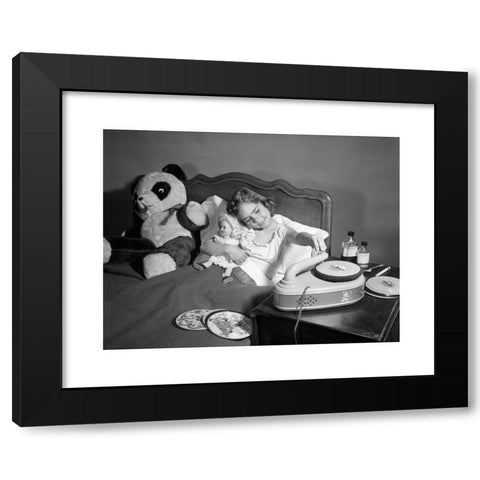 1960's Image Collection by ClassicStock - Black Modern Wood Framed Art Print Titled: 1950s SICK LITTLE GIRL IN BED PLAYING WITH RECORD PLAYER