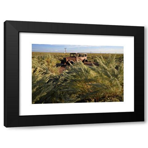 1960's Image Collection by Victor Watts - Black Modern Wood Framed Art Print Titled: Abandoned rusted car on Route 66, Petrified Forest National Park in Arizona, USA