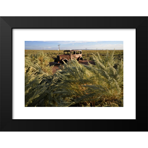 1960's Image Collection by Victor Watts - Black Modern Wood Framed Art Print Titled: Abandoned rusted car on Route 66, Petrified Forest National Park in Arizona, USA