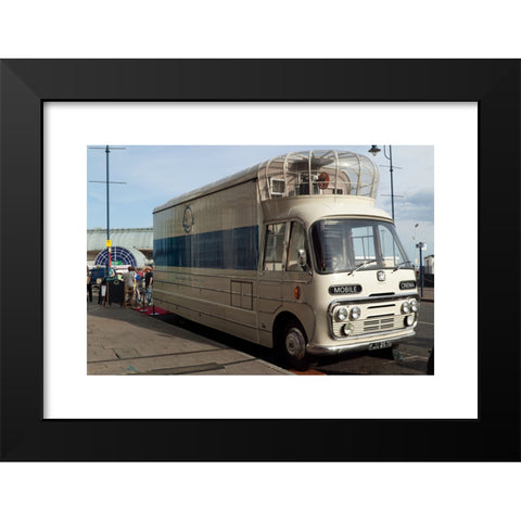 1960's Image Collection by John Gaffen - Black Modern Wood Framed Art Print Titled: Image of a rare mobile cinema unit built on a bedford SB chassis with coachwork by Coventry Steel Caravans.