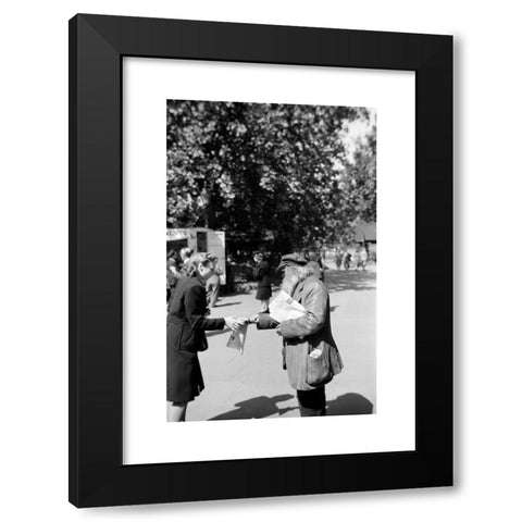 1960's Image Collection by Heritage Image Partnership Ltd - Black Modern Wood Framed Art Print Titled: Newspaper seller, London, c1945-c1965. Artist: SW Rawlings