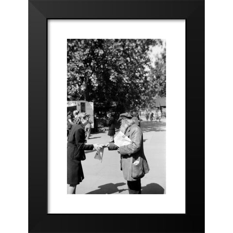 1960's Image Collection by Heritage Image Partnership Ltd - Black Modern Wood Framed Art Print Titled: Newspaper seller, London, c1945-c1965. Artist: SW Rawlings