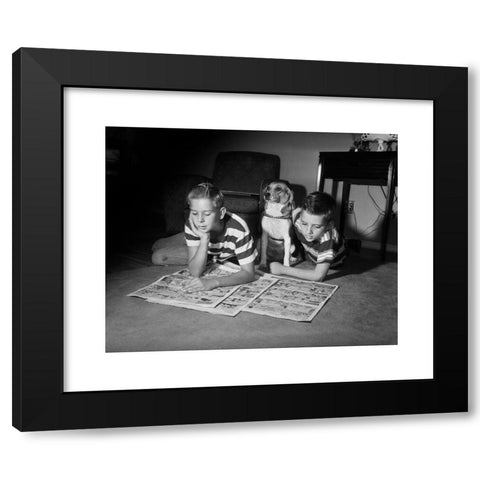 1960's Image Collection by ClassicStock - Black Modern Wood Framed Art Print Titled: 1950s TWO BOYS READING SUNDAY COMICS LIVING ROOM FLOOR DOG INDOOR FUNNY PAPERS NEWSPAPERS