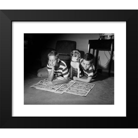 1960's Image Collection by ClassicStock - Black Modern Wood Framed Art Print Titled: 1950s TWO BOYS READING SUNDAY COMICS LIVING ROOM FLOOR DOG INDOOR FUNNY PAPERS NEWSPAPERS