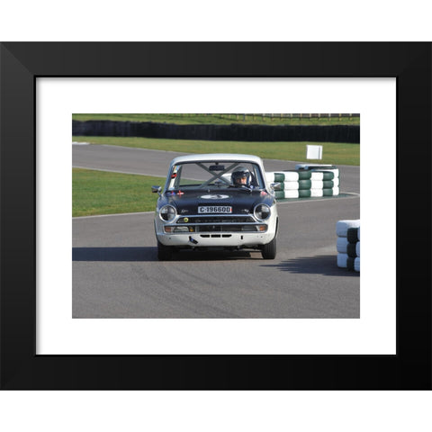 1960's Image Collection by Matthew Richardson - Black Modern Wood Framed Art Print Titled: Classic 1960s race car going through the chicane at Goodwood motor circuit - Mk1 Ford Cortina