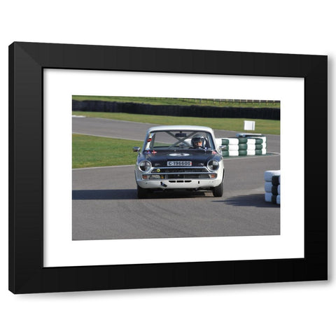 1960's Image Collection by Matthew Richardson - Black Modern Wood Framed Art Print Titled: Classic 1960s race car going through the chicane at Goodwood motor circuit - Mk1 Ford Cortina