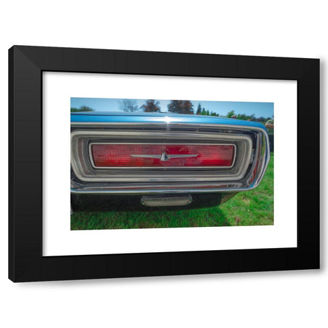 1960's Image Collection by Michael Brooks - Black Modern Wood Framed Art Print Titled: Detail of the rear light of a blue 1960s Ford Thunderbird car.