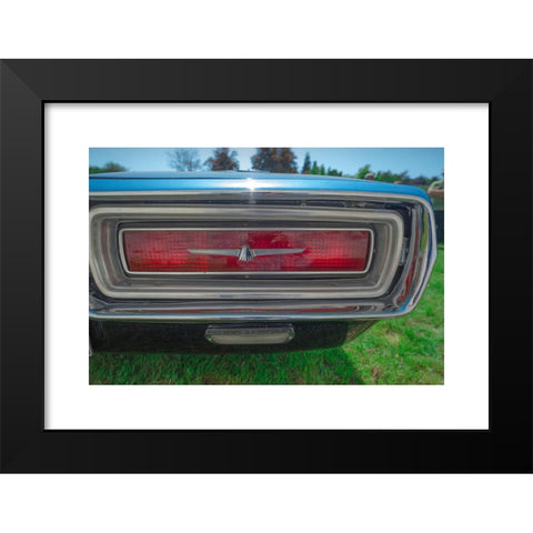 1960's Image Collection by Michael Brooks - Black Modern Wood Framed Art Print Titled: Detail of the rear light of a blue 1960s Ford Thunderbird car.