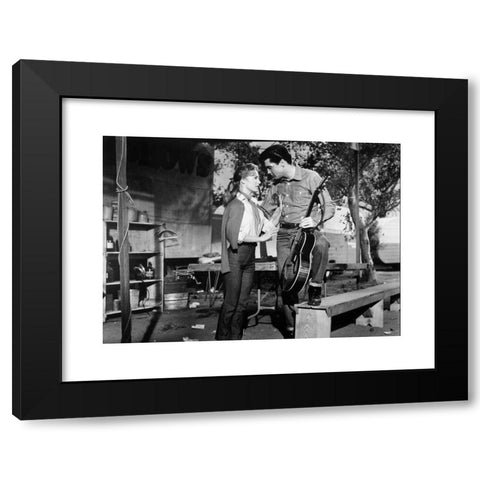 1960's Image Collection by Photo 12 - Black Modern Wood Framed Art Print Titled: Roustabout Year: 1964 USA Director: John Rich Elvis Presley , Joan Freeman. It is forbidden to reproduce the photograph out of context of the promotion of the