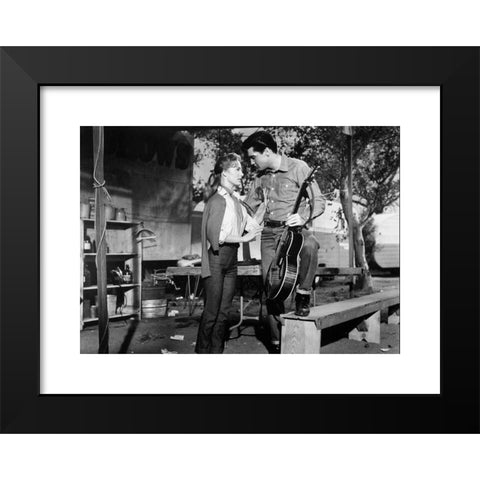 1960's Image Collection by Photo 12 - Black Modern Wood Framed Art Print Titled: Roustabout Year: 1964 USA Director: John Rich Elvis Presley , Joan Freeman. It is forbidden to reproduce the photograph out of context of the promotion of the