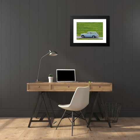 1960's Image Collection by Arterra Picture Library - Black Modern Wood Framed Art Print Titled: Elderly couple driving 1967 classic car Triumph Herald 1200 Estate along country road through meadow