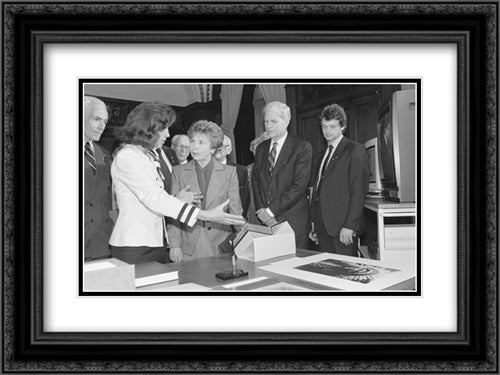 Mrs. Gorbachev looking at books, 5/31/90 24x18 Black Ornate Wood Framed Art Print Poster with Double Matting by Library of Congress