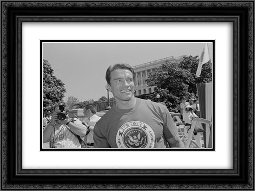Arnold Schwarzenegger on Capitol Hill for an event related to the President's Council on Physical Fitness and Sports 24x18 Black Ornate Wood Framed Art Print Poster with Double Matting by Library of Congress