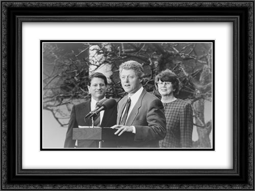 President Bill Clinton, half-length portrait, standing at microphones, with Albert Gore and Janet Reno 24x18 Black Ornate Wood Framed Art Print Poster with Double Matting by Library of Congress