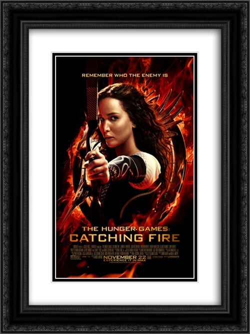 The Hunger Games Catching Fire 18x24 Black Ornate Wood Framed Movie Poster with Double Matting