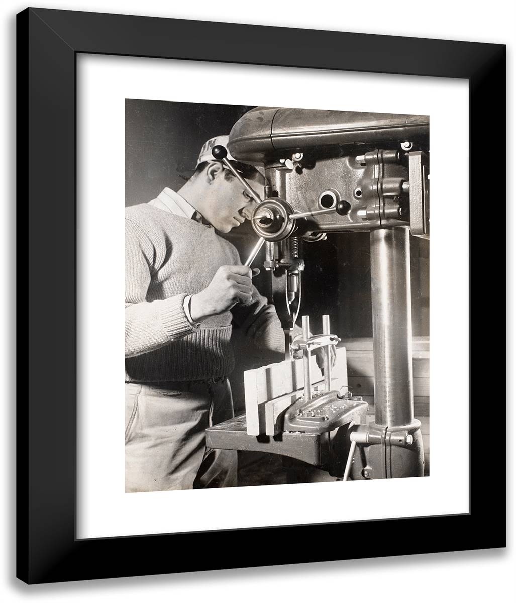 Man Uses a Machine to Drill Holes in Two Wood Blocks 20x24 Black Modern Wood Framed Art Print Poster by Eagle, Arnold