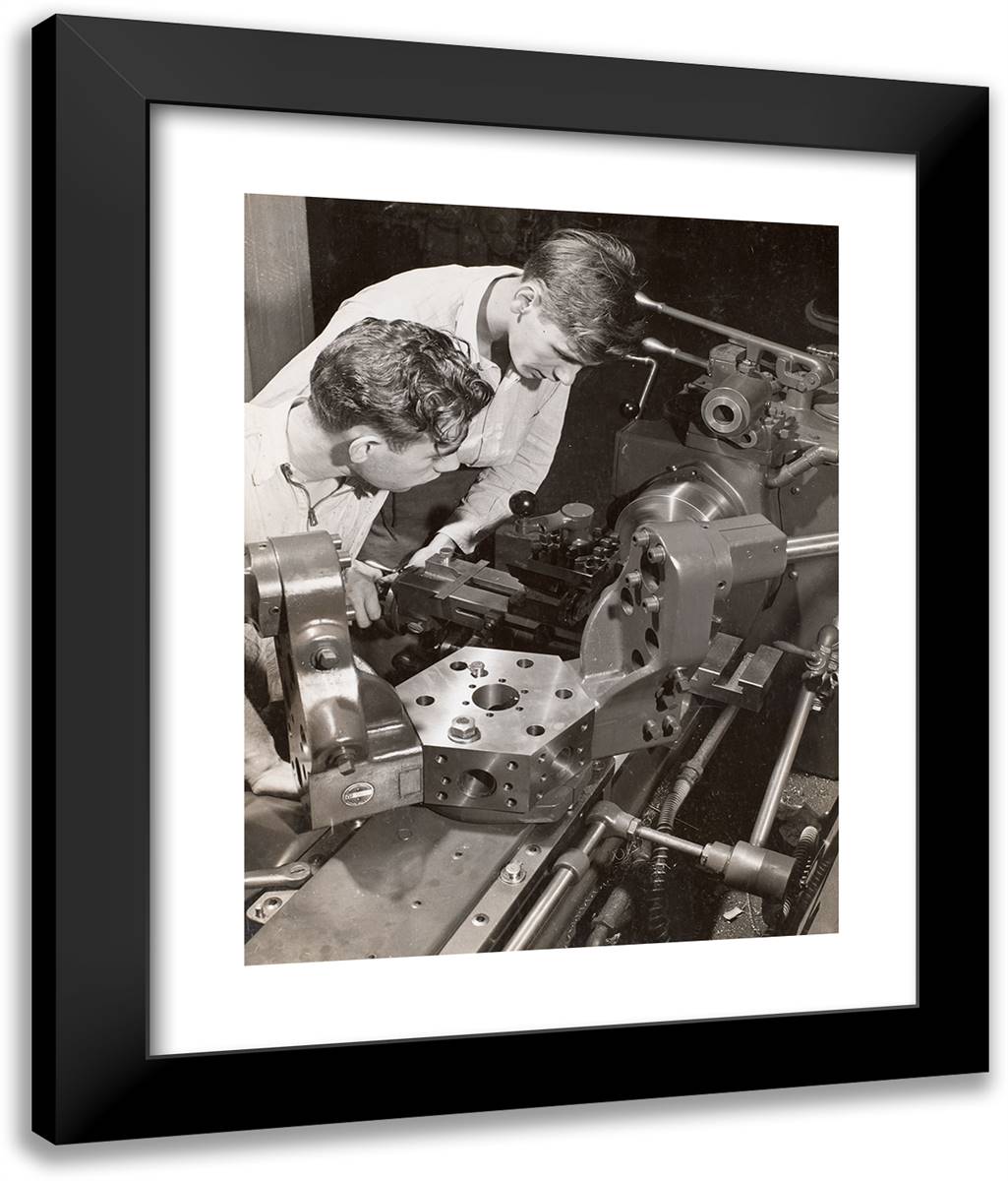Two Young Men Stand Over a Piece of Machinery 20x24 Black Modern Wood Framed Art Print Poster by Eagle, Arnold
