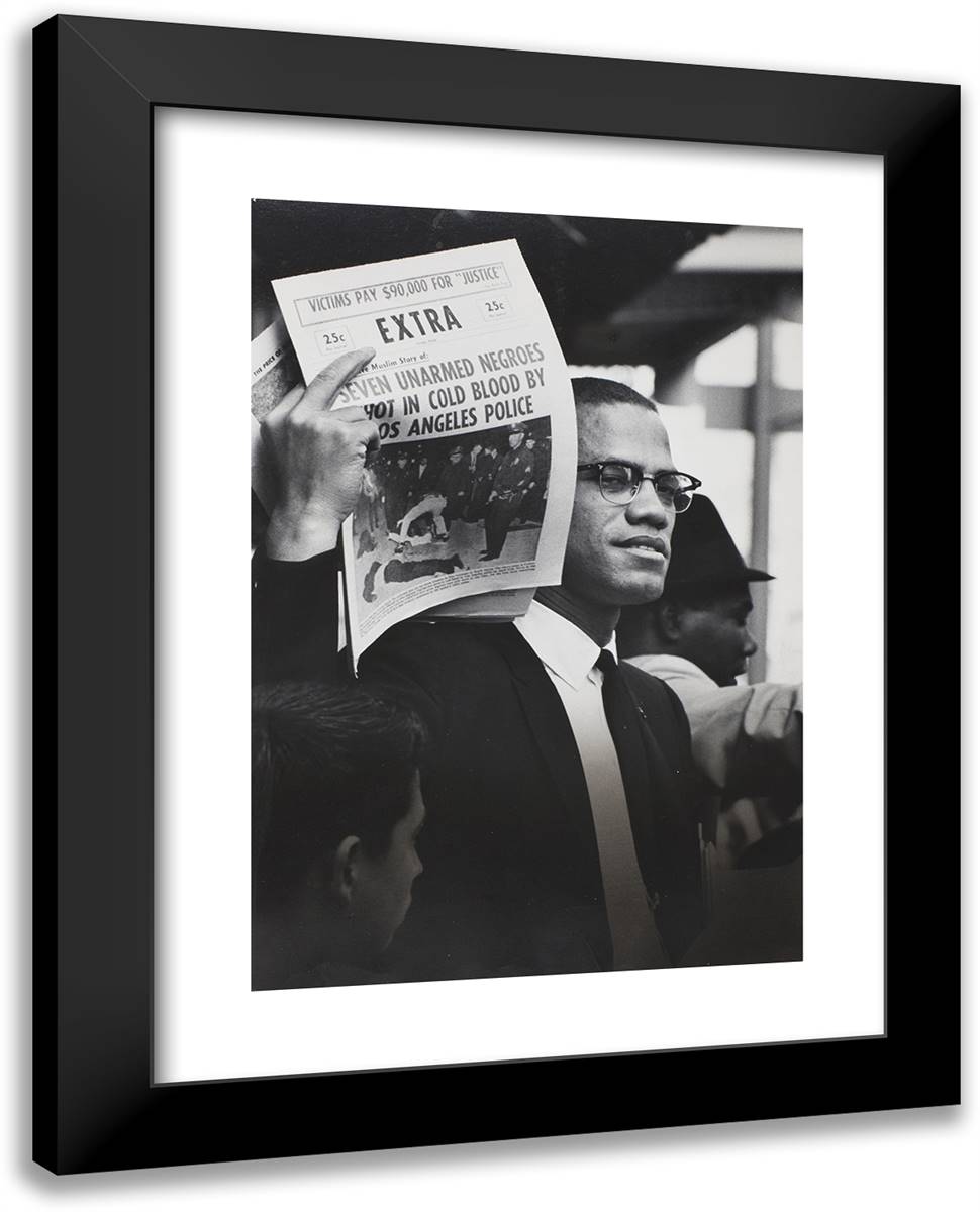 Malcolm X Holding up Black Muslim Newspaper, Los Angeles, California 19x24 Black Modern Wood Framed Art Print Poster by Parks, Gordon