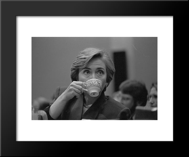 First Lady Hillary Clinton, Head-And-Shoulders Portrait, Sipping From A Teacup During Her Presentation On Health Care 20x24 Black Modern Wood Framed Art Print Poster by Library of Congress