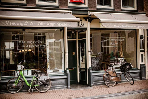 Amsterdam Storefront with Bikes White Modern Wood Framed Art Print with Double Matting by Berzel, Erin