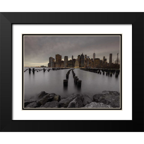Manhattan skyline with rows of groynes in East river, New York Black Modern Wood Framed Art Print with Double Matting by Frank, Assaf