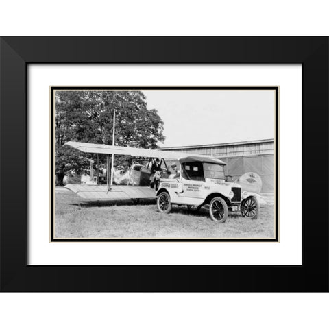 Ford Towing Plane Black Modern Wood Framed Art Print with Double Matting by Unknown