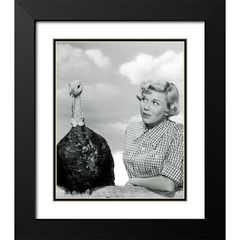 Doris Day with a Thanksgiving Turkey Black Modern Wood Framed Art Print with Double Matting by Hollywood Photo Archive