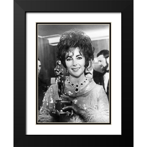Elizabeth Taylor - Holding an Oscar Black Modern Wood Framed Art Print with Double Matting by Hollywood Photo Archive