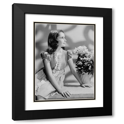 Elizabeth Taylor Black Modern Wood Framed Art Print with Double Matting by Hollywood Photo Archive